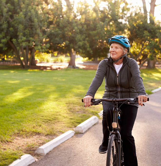 Image of a woman riding a bicycle